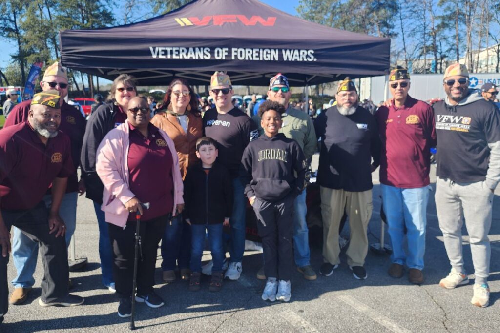 camaraderie shared by VFW members at Caffeine & Octane car show